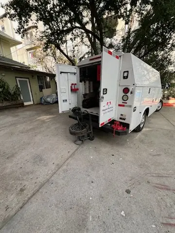 Magnet Plumbing service vehicle on-site for Grease Trap Cleaning in Viera North